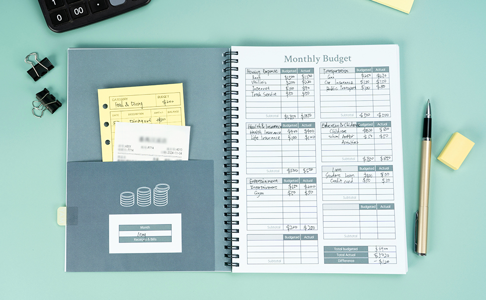 A budget notebook open to handwritten monthly expenses next to a health insurance booklet and a pen