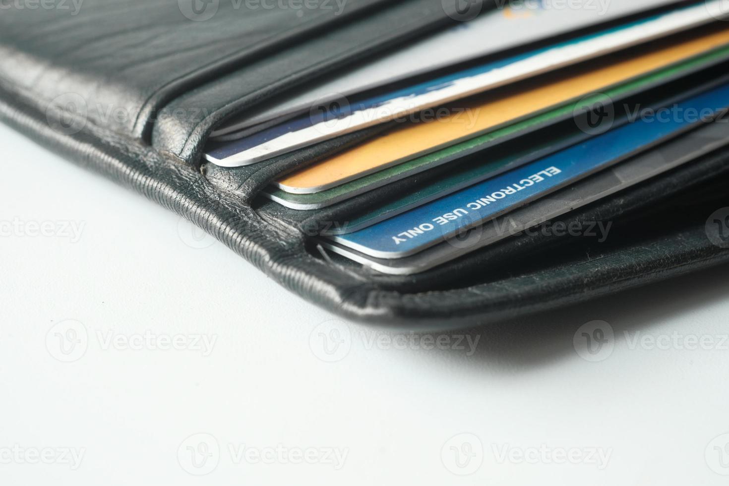 A close-up photo of a credit card partially pulled from a wallet in natural light, realistic lifestyle photography style