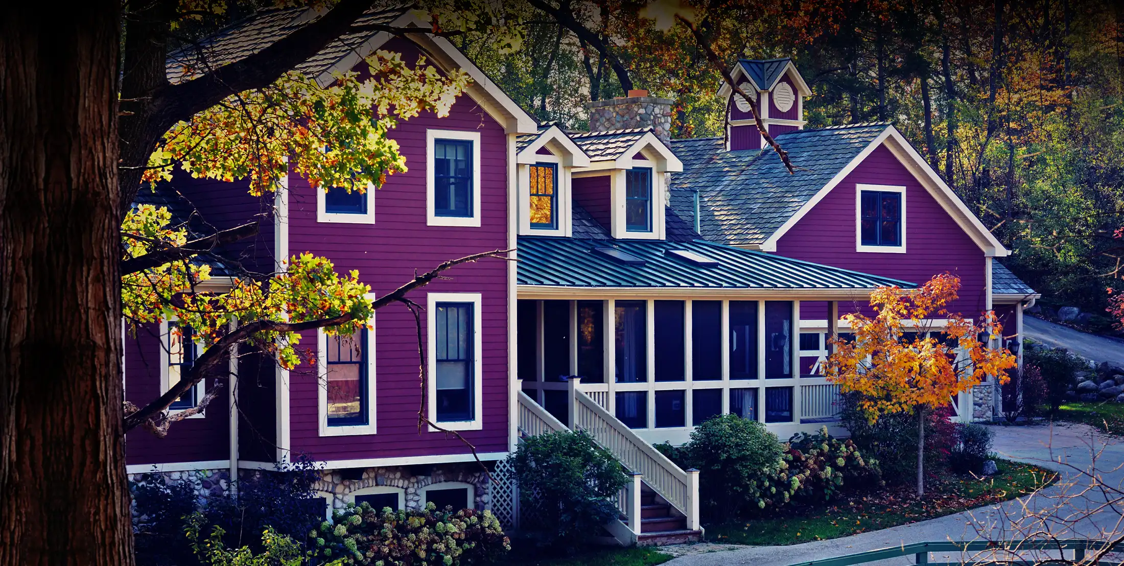 A home appraiser standing on a suburban sidewalk measuring the exterior of a single family home with a tape measure and clipboard, realistic photography style