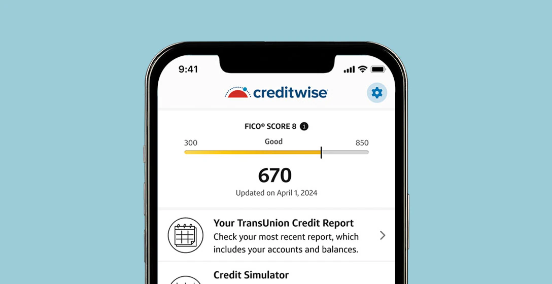 A person holding a smartphone while checking a credit score app at home in natural window light, realistic photo