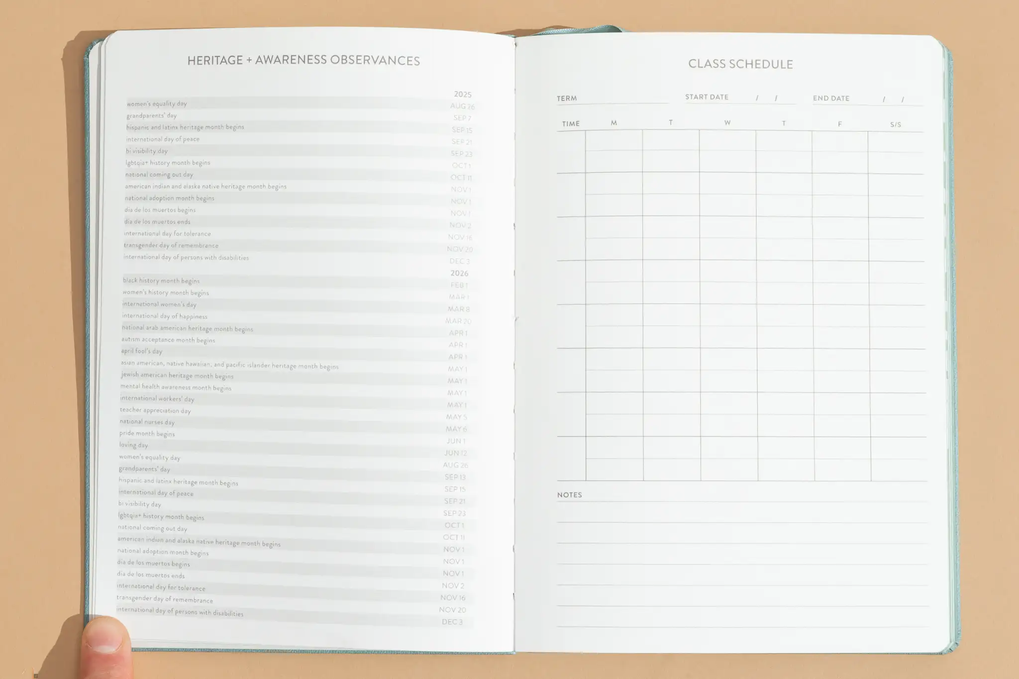 A person sitting at a kitchen table with a notebook, calculator, and retirement account statements spread out, candid real-life photo